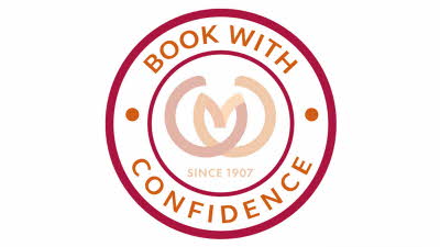 Circular logo with the words Book with Confidence surrounding the Caravan and Motorhome Club logo