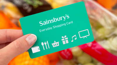 Sainsbury's Everyday Shopping Card with groceries in the background