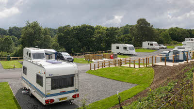 Motorhomes and caravans parked up at the campsite